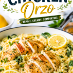 Creamy Lemon Chicken Orzo served in a skillet with sliced grilled chicken breast, fresh lemon slices, spinach, and Parmesan cheese, topped with a bold Lemon Chicken Orzo recipe title.